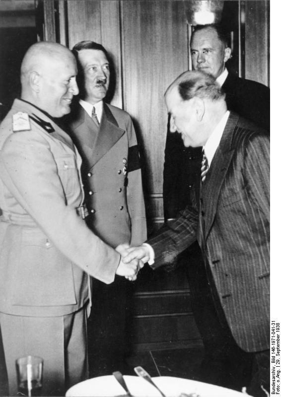 Benito Mussolini shaking hands with French prime minister Edouard Daladier after the signing of the Munich agreement